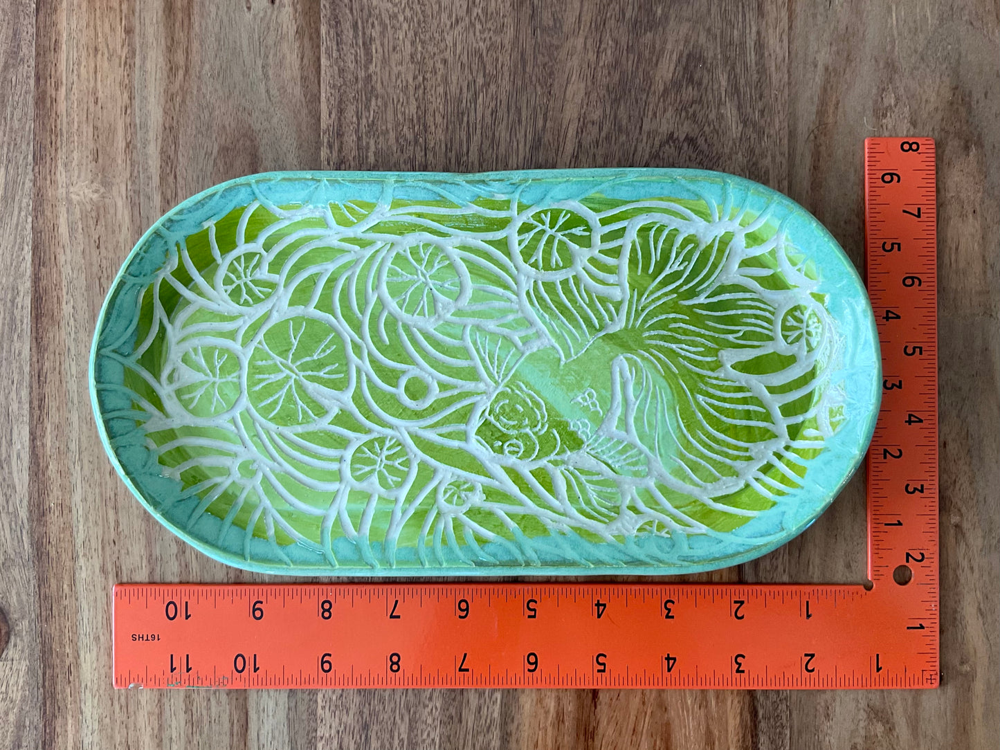 Oranda fish and lily pad sgraffito tray