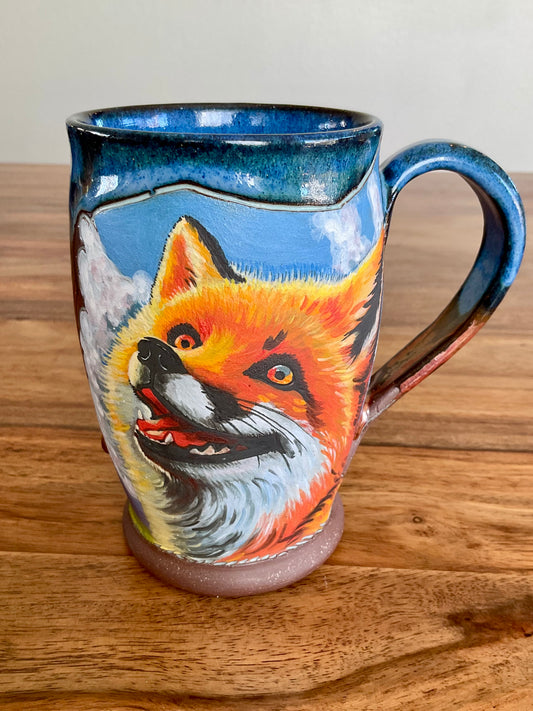 Laughing fox and mountains mug