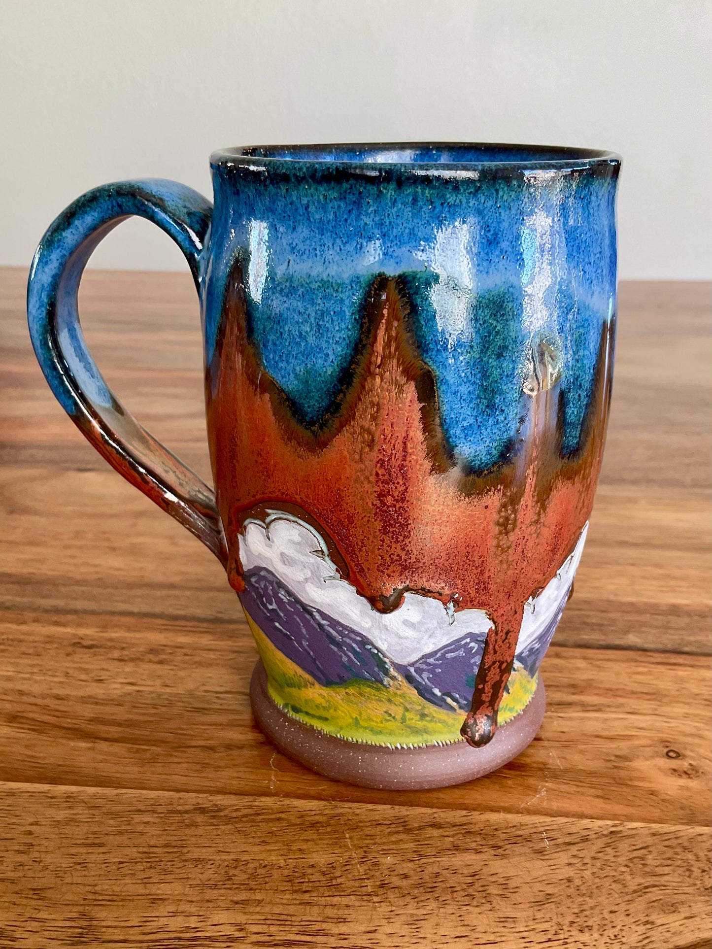 Laughing fox and mountains mug