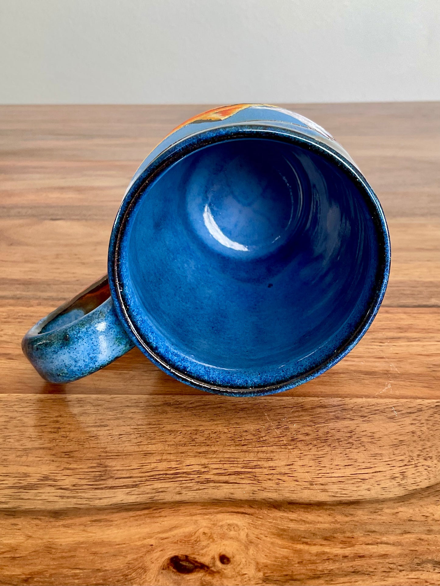 Laughing fox and mountains mug