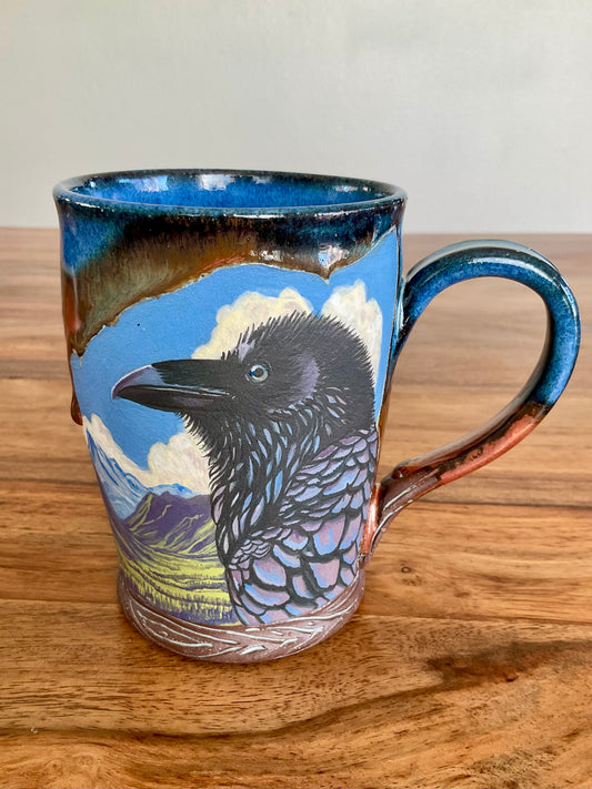 Raven amongst the mountains mug