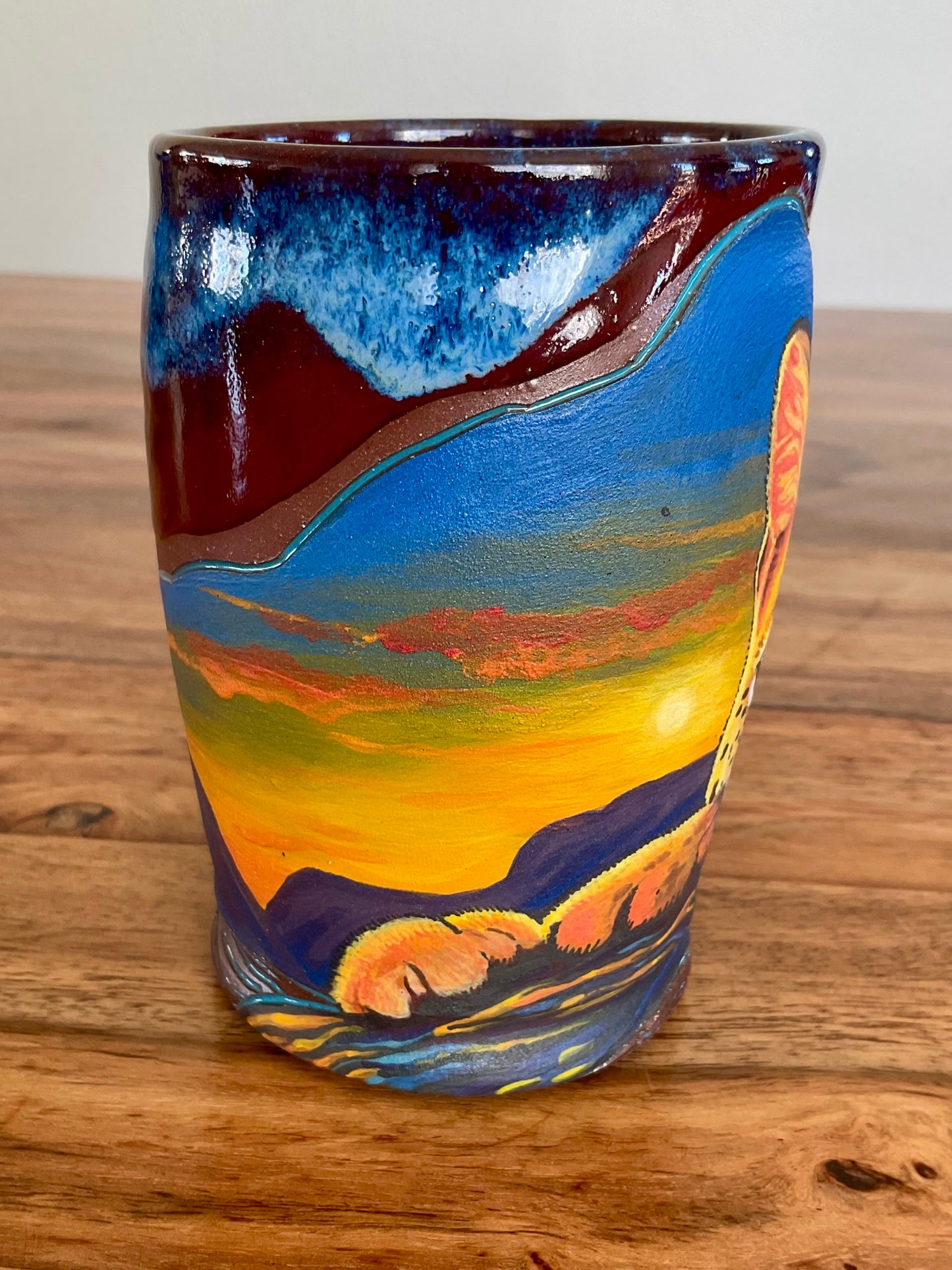 Serval cat and sunset desert mug